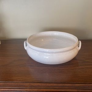 Handmade ceramic decorative bowl with signature at the bottom